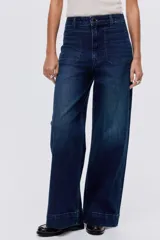 Jean wide leg de denim azul oscuro con leve stretch, tiro alto y bolsillos delanteros de parche.