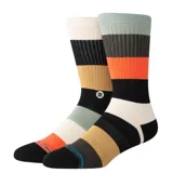 Par de medias Stance de caña media con diseño a rayas horizontales en tonos beige, negro, verde, naranja y blanco.