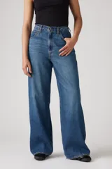 Jean de corte baggy con tiro medio y pierna ancha, confeccionado en denim azul con lavado clásico.