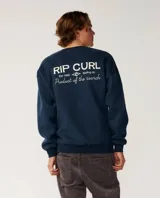 Buzo azul marino Rip Curl con cuello redondo, mangas largas y estampa trasera en color blanco con texto y logo de la marca.