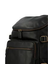 Mochila Hush Puppies fabricada en cuero natural negro, con compartimento principal con cierre, bolsillo acolchado para laptop, múltiples bolsillos frontales y laterales con cierre, cintas laterales ajustables y correas acolchadas.