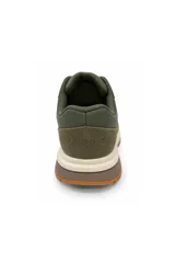 Zapatilla combinada en tonos beige, marrón y verde, con diseño acordonado, detalles en contraste y suela de goma con relieve.