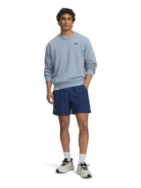 Short deportivo Under Armour modelo UA Launch 7, color azul, con bolsillos laterales, forro interior y logo reflectante.