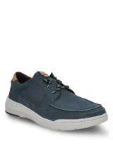 Zapato casual Hush Puppies modelo Fontier, confeccionado en cuero azul marino con detalles en color suela en el talón y lengüeta. Presenta suela de EVA con tecnología Duo-Balance para mayor ligereza y estabilidad, y cierre mediante cordones bicolores.
