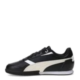 Championes urbanos Puma modelo Bella Donna L, color negro con detalles en beige. Presentan un diseño de perfil bajo con la icónica franja lateral de la marca en contraste, cierre de cordones y suela de goma texturizada.