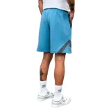 Bermuda deportiva Umbro Rub, color azul con detalles en gris oscuro en los laterales. Cuenta con cintura elástica ajustable con cordón y el logo de Umbro bordado en la pierna izquierda.