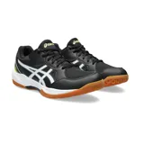 Championes Asics Gel-Task 3, diseñados para deportes de interior. Presentan un diseño en color negro con detalles en blanco y toques de amarillo neón en el talón. Cuentan con una suela de goma color caramelo, ideal para superficies de cancha, y el logo de la marca en los laterales.