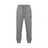 Pantalón de jogging Nike Jordan, confeccionado en tejido fleece gris melange. Presenta cintura elástica con cordón ajustable, bolsillos laterales y puños elásticos en los tobillos. Incluye un pequeño parche con el logo Jumpman en la pierna izquierda.
