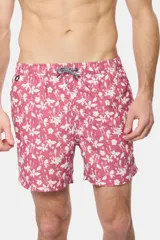 Short de baño clásico con estampado de flores blancas sobre fondo azul marino, cintura elástica con cordón ajustable, dos bolsillos laterales y suspensor de malla fina.