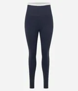 Legging deportiva color verde con cintura alta en contraste color blanco. Confeccionada en tejido de poliamida y elastano, con ajuste ceñido al cuerpo.