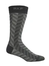 Medias de caña media confeccionadas en fibra de bambú, con diseño de patrón en zigzag en tonos gris y negro. Presentan el logo de la marca tejido en la parte superior y talón reforzado.