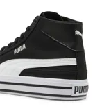 Championes de media caña Puma Court Classic Vulc Mid, color negro con detalles en blanco, franja lateral característica de la marca y suela vulcanizada con líneas decorativas.