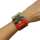 Pulsera de asta con eslabones combinados en asta natural, negro y naranja.