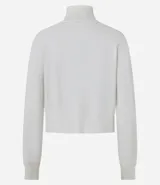 Blusa básica de punto marca Blue Steel, con cuello alto y manga larga. Confeccionada en tejido de punto recto con textura suave y cómoda.