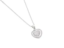Collar de plata 925 con dije en forma de corazón con interior de nácar y circonias.