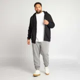 Buzo de chándal negro con cremallera frontal, capucha ajustable con cordón y bolsillos laterales.