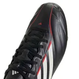 Championes de fútbol Adidas Copa Pure IV FG/MG, color negro con las tres tiras clásicas de la marca en blanco y detalles en rojo.