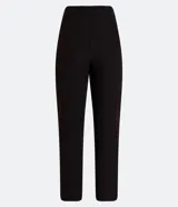 Pantalón zanahoria de sastrería color blanco, con cintura alta, trabillas y botón contrastante.