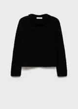Jersey de punto grueso con efecto pelo, cuello redondo y manga larga. Diseño recto y textura suave.