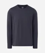 Remera térmica de manga larga con cuello redondo, confeccionada en tejido técnico ligero y elástico. Diseño liso y minimalista, ideal para actividades deportivas.