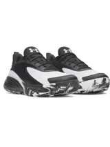 Championes Under Armour Lockdown 8, de diseño deportivo en color negro y blanco, con suela de goma con patrón marmolado y detalles reflectantes.