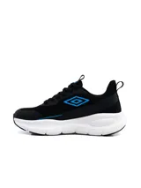 Championes de running Umbro modelo Dynamen para mujer, en color negro con suela blanca gruesa y detalles en celeste.
