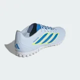 Championes de fútbol Adidas Predator Club para pasto sintético, color celeste con detalles en azul y amarillo. Presentan un diseño aerodinámico con tecnología PowerSpine para mayor estabilidad y NanoStrike para precisión en el movimiento.