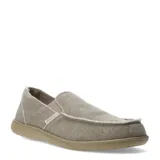 Zapatos tipo slip-on de tela color beige con bordes deshilachados y suela de goma al tono.