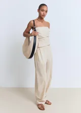 Top strapless de algodón con diseño entallado, fruncidos laterales y cierre de cremallera lateral.