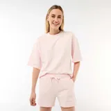 Camiseta de manga 3/4 en felpa color rosado, con cuello redondo y diseño holgado.