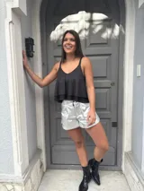 Musculosa negra de morley de lurex con breteles finos.