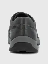 Zapato casual de cuero color gris oscuro con cordones al tono. Presenta costuras reforzadas, suela de caucho antideslizante y diseño de punta redonda.
