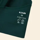 Sujetador deportivo de sujeción ligera en color verde oscuro, con diseño acanalado, escote redondo y espalda cruzada.