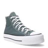 Championes Converse modelo Chuck Taylor All Star Lift con diseño de plataforma, confeccionados en lona color verde petróleo. Presentan puntera de goma blanca, cordones blancos y suela de plataforma con franjas negras.