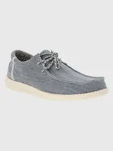 Zapato tipo alpargata de tejido textil gris con cordones decorativos y suela de EVA color crema. Diseño ligero y flexible con tecnología ZeroG.