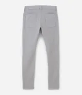 Pantalón de sarga corte súper skinny, color beige, con cierre de botón y cremallera, bolsillos laterales y traseros.