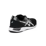 Championes de running Asics Gel-Kamo Go para mujer, color negro con detalles en blanco y líneas geométricas en los laterales.