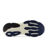 Championes de running New Balance modelo 680, color azul marino con logo lateral en blanco y suela de espuma en tono crema.