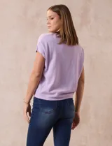 Buzo tejido color blanco, marca Ninety. Escote en V. Calado en escote y delantera.