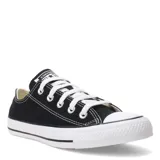 Championes Converse Chuck Taylor All Star de lona negra con suela de goma blanca y cordones blancos.