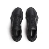 Championes Merrell modelo Speedarc Matis, color negro con detalles en gris oscuro. Presenta un diseño técnico con entresuela de espuma FloatPro, tecnología FlexPlate para mayor estabilidad y suela Vibram MegaGrip. Incluye sistema de cordones elásticos y empeine de malla transpirable con refuerzos de TPU.