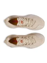 Championes de básquetbol Under Armour Curry 12, color beige con detalles en tonos vibrantes como verde, rosa y amarillo en la entresuela. Presentan un diseño técnico con parte superior de malla transpirable, contrafuerte de TPU en el talón y tecnología de amortiguación UA Flow para mayor rebote y agarre en la cancha.