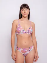Bombacha de bikini colaless con estampado de flores multicolor.