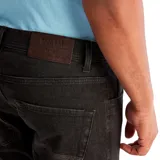 Pantalón Timberland de denim negro, corte recto, con bolsillos delanteros y traseros.