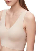 Bralette color piel de microfibra sin costuras, con copas sin relleno y breteles anchos.