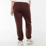 Pantalón de jogging color borgoña, con cintura elástica ajustable con cordón y tobillos ajustados.