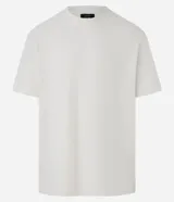 Remera color arena de corte relaxed, confeccionada en algodón texturizado.