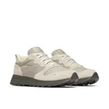 Sneaker Merrell modelo Alpine 83, color beige con detalles en gris oscuro. Presenta una combinación de gamuza y textil en la parte superior, con entresuela de espuma EVA y suela de goma.