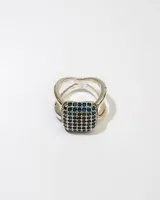 Anillo de plata 925 con dublé de oro y zirconias azules.