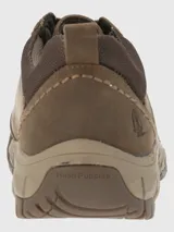 Zapato urbano de estilo outdoor confeccionado en cuero marrón con detalles de malla y perforaciones laterales. Cuenta con suela tecnológica Spinal Flex de goma para mayor amortiguación y soporte.